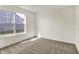 Cozy carpeted bedroom with a large window and lots of natural light at 19762 Highclere Lane, Sheridan, IN 46069