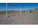 A playground with swings and slides, with community pond and fountain in the background, all set in a well-maintained area at 2039 Quail West Dr, Danville, IN 46122