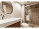 Updated bathroom with modern vanity, sink, and glass-enclosed shower at 2055 Mulsanne Dr, Zionsville, IN 46077