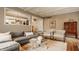 Comfortable living room featuring hardwood floors, neutral tones, and stylish furniture at 2055 Mulsanne Dr, Zionsville, IN 46077
