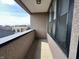 Balcony with view of neighboring city buildings at 225 N New Jersey St # 46, Indianapolis, IN 46204