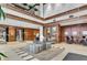 Expansive lobby with upscale decor, unique wood paneling, modern tile and comfortable seating at 225 N New Jersey St # 46, Indianapolis, IN 46204