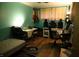 Bedroom featuring wood floor, table, lamps and instruments at 2315 Redfern Dr, Indianapolis, IN 46227