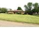 Well-maintained ranch-style home with a sprawling green lawn and mature trees at 2315 Redfern Dr, Indianapolis, IN 46227
