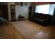 Inviting living room with hardwood floors and comfortable brown couch at 2315 Redfern Dr, Indianapolis, IN 46227