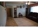 Inviting living room with hardwood floors and comfortable brown couch at 2315 Redfern Dr, Indianapolis, IN 46227