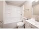Bathroom features a shower and tub combo, toilet, and a single sink vanity at 2740 Pawnee Dr, Indianapolis, IN 46229