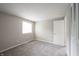 This light and airy bedroom has neutral colored walls and soft carpet at 2740 Pawnee Dr, Indianapolis, IN 46229