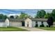 Charming single-story home featuring a well-maintained lawn and attached garage at 310 Styleline Dr, Mooresville, IN 46158