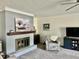 The living room is equipped with an updated fireplace and an accent wall at 310 Styleline Dr, Mooresville, IN 46158