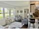 Cozy living room features natural light, complementary furniture, and stylish decor at 310 Styleline Dr, Mooresville, IN 46158