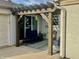 Lovely backyard patio with a wooden pergola, stylish outdoor furniture, and ample space for gatherings at 310 Styleline Dr, Mooresville, IN 46158