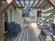 Inviting patio with stylish outdoor furniture, a decorative rug, and a charming pergola with string lights at 310 Styleline Dr, Mooresville, IN 46158