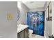 Bathroom featuring a sink with black cabinets and a bathtub with a whimsical dog shower curtain at 3214 Limber Pine Dr, Whiteland, IN 46184