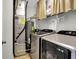 Practical laundry room with modern washer and dryer set and efficient utility systems at 3214 Limber Pine Dr, Whiteland, IN 46184