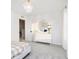 Bright and airy bedroom features a round mirror, a stylish dresser, and a soft color palette at 3226 Promenade Way, Brownsburg, IN 46112