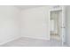 Comfortable bedroom with soft carpeting, a window, and a doorway to the rest of the home at 3226 Promenade Way, Brownsburg, IN 46112