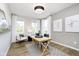 Bright office space with natural light, a modern desk, and stylish decor for a comfortable work environment at 3226 Promenade Way, Brownsburg, IN 46112