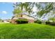 Spacious backyard shows the home's exterior brick and siding features at 3325 Broadview Ct, Indianapolis, IN 46227