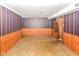 Unfinished basement featuring paneled walls and a vintage-style at 3325 Broadview Ct, Indianapolis, IN 46227