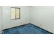 Room with dated features including carpet, pale blue walls, and a window letting in natural light at 3325 Broadview Ct, Indianapolis, IN 46227