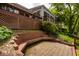 Backyard features brick patio, multi-level deck and stairs leading to the lake at 3430 Bay Road South Dr, Indianapolis, IN 46240