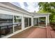 Outdoor deck with stunning lake views and easy access to the sunroom at 3430 Bay Road South Dr, Indianapolis, IN 46240