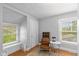 Bedroom with a nook, hardwood floors, neutral paint, and natural light at 3614 Guilford Ave, Indianapolis, IN 46205