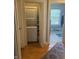 Hall laundry closet with washer and dryer at 3614 Guilford Ave, Indianapolis, IN 46205