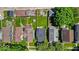 Aerial shot capturing the house among neighboring houses, showcasing a spacious backyard and fencing at 405 N Drexel Ave, Indianapolis, IN 46201