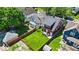 Aerial view of a home with a spacious backyard and neighboring houses in a residential area at 405 N Drexel Ave, Indianapolis, IN 46201
