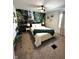 Comfortable bedroom featuring a waterfall mural wall, offering a serene and natural aesthetic at 426 St Paul St, Indianapolis, IN 46201
