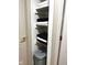 Linen closet with neat stacks of towels and a laundry basket at 426 St Paul St, Indianapolis, IN 46201