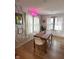 Inviting dining room with a wooden table, modern chairs, and unique wall accents at 426 St Paul St, Indianapolis, IN 46201