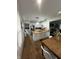 Bright kitchen featuring a central island, stainless steel appliances, and open layout at 426 St Paul St, Indianapolis, IN 46201
