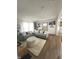 Bright and airy living room with stylish sofas, a plush rug, and contemporary decor at 426 St Paul St, Indianapolis, IN 46201