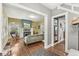 Inviting living room featuring hardwood floors, a cozy fireplace, and comfortable seating at 5002 Broadway St, Indianapolis, IN 46205