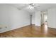 Bedroom features hardwood flooring and natural light at 5038 Allisonville Rd # E, Indianapolis, IN 46205