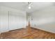 Bedroom with hardwood flooring, ceiling fan and closet at 5038 Allisonville Rd # E, Indianapolis, IN 46205