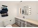 Updated bathroom featuring an updated vanity with a large mirror and towel rack at 5200 N Leslie Dr, Muncie, IN 47304