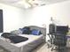 Modern bedroom featuring a plush bed, a dedicated desk area, and stylish decor, designed for comfort and functionality at 5200 N Leslie Dr, Muncie, IN 47304