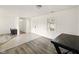 Bright living area with multiple flooring types, window view and front door at 5200 N Leslie Dr, Muncie, IN 47304