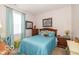 Inviting bedroom with stylish decor, comfortable bed and natural light at 5410 Brassie Dr, Indianapolis, IN 46235
