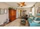 Comfortable living room with ceiling fan, stylish furniture, and hardwood flooring at 5410 Brassie Dr, Indianapolis, IN 46235