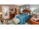 Comfortable bedroom with decorative pillows, wood furniture and unique decor at 5410 Brassie Dr, Indianapolis, IN 46235