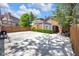 The backyard features a concrete patio and well-maintained fence, offering potential for various outdoor activities at 543 Fletcher Ave, Indianapolis, IN 46203