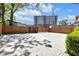 Spacious backyard featuring a concrete patio, wooden fence, and potential for outdoor activities at 543 Fletcher Ave, Indianapolis, IN 46203