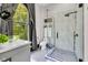 Beautiful bathroom features a glass shower, modern toilet, and a unique glass sink at 543 Fletcher Ave, Indianapolis, IN 46203