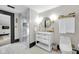Elegant bathroom featuring a glass-enclosed shower and modern vanity with attractive gold fixtures at 543 Fletcher Ave, Indianapolis, IN 46203