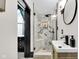 Chic bathroom with a glass enclosed shower, and a modern vanity at 543 Fletcher Ave, Indianapolis, IN 46203